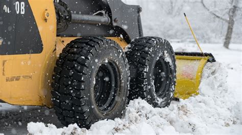 skid steer stuck in snow|skid steer tires in snow.